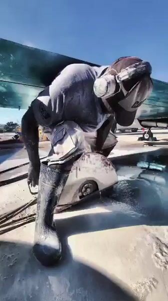Another day cutting hard concrete under airplanes