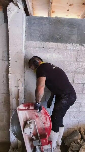 Making some beautiful clean cuts on the wall